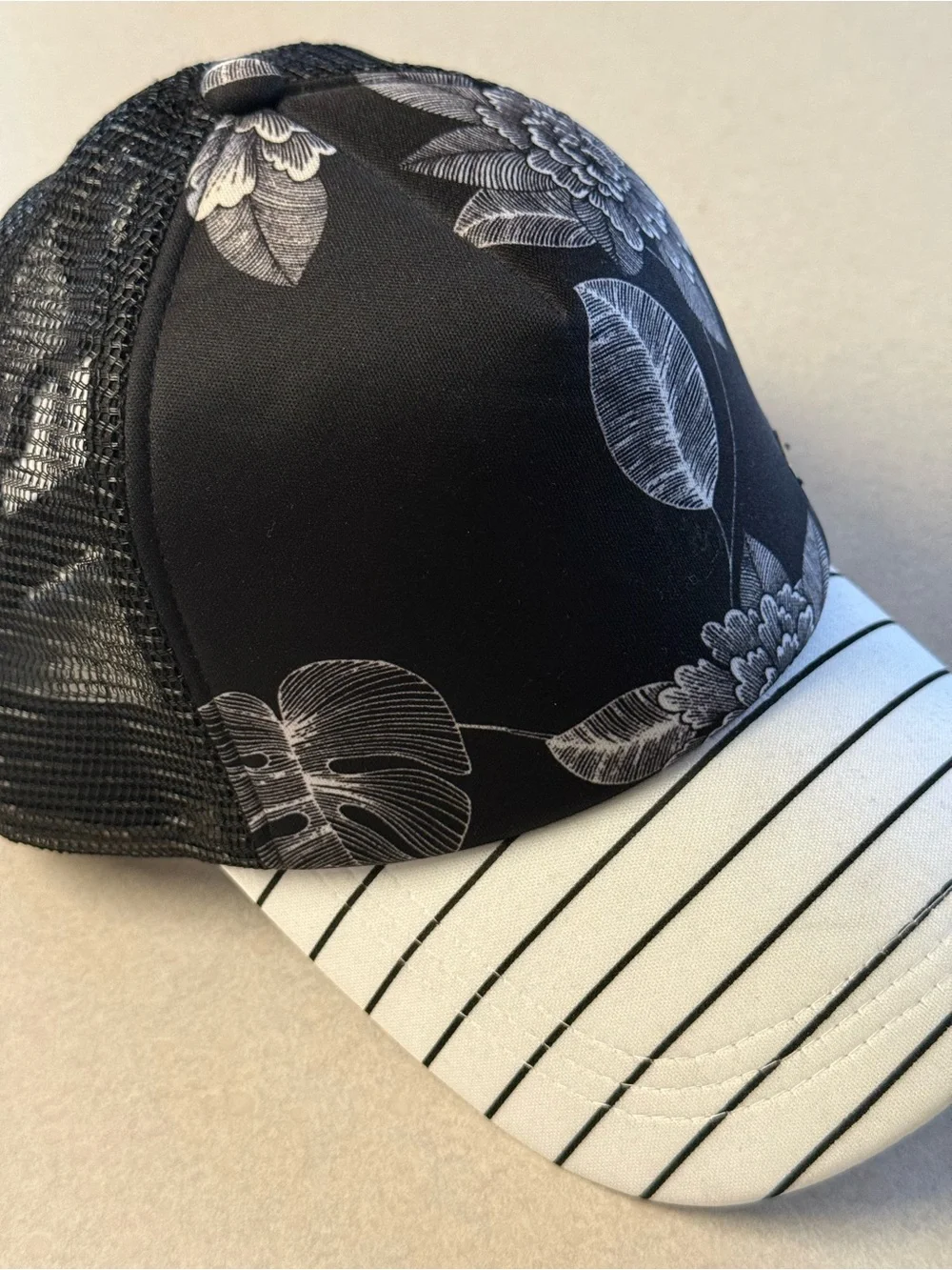 Roxy Black Floral Trucker Hat with White Striped Brim